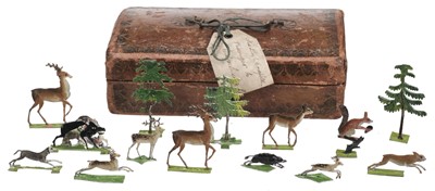 Lot 477 - Toy Animals. A collection of small painted metal toy animals and figures, mid 19th century