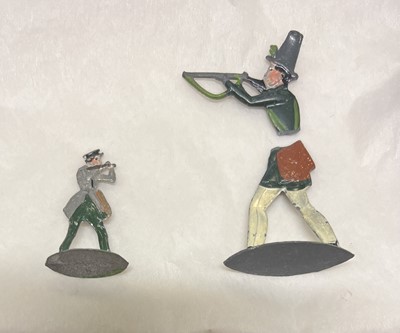 Lot 477 - Toy Animals. A collection of small painted metal toy animals and figures, mid 19th century