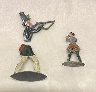 Lot 477 - Toy Animals. A collection of small painted metal toy animals and figures, mid 19th century