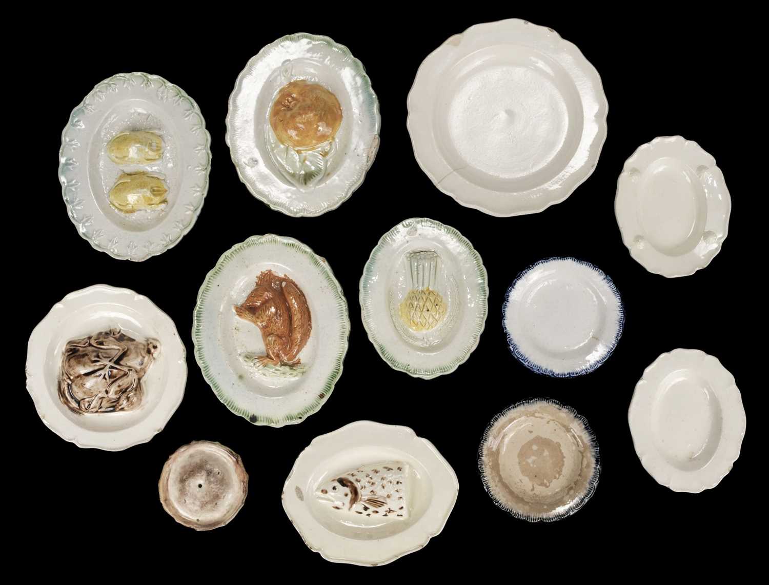 Lot 481 - Creamware & Pearlware. 6 moulded toy oval platters, circa 1830