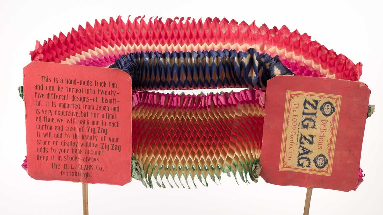 Lot 484 - Advertising Fan. Zig Zag trick fan for D.L. Clark Co., Japan: circa 1910, & other advertising fans