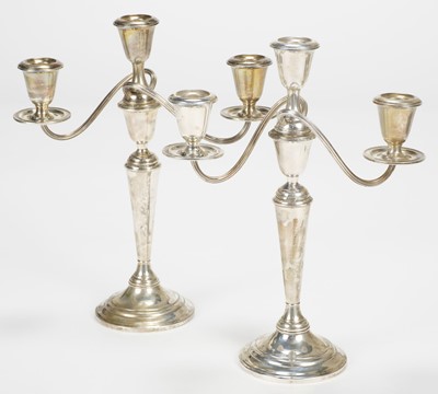 Lot 747 - American Silver. A pair of Newport Sterling silver three-branch candelabra