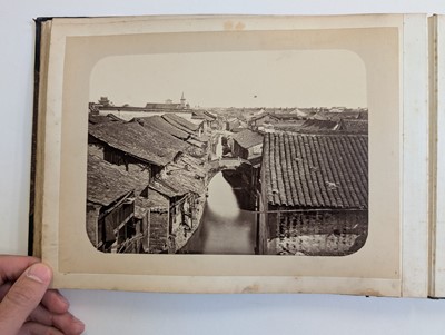 Lot 12 - China. An album of 24 photographs of Shanghai and Peking, c. 1870s/1880s