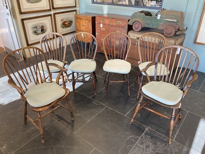 Lot 671 - Chairs. A set of six elm stick back chairs, 19th century