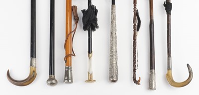 Lot 607 - Umbrellas, Walking Sticks, & Parasols. A group, 19th & early 20th century