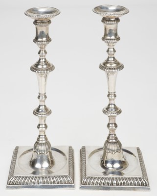 Lot 753 - Candlesticks. A pair of George III silver table candlesticks, by Ebenezer Coker, London, 1764