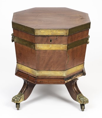 Lot 669 - Celleret. A George III mahogany celleret