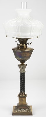 Lot 731 - Oil Lamp. A Victorian brass and ebonised oil lamp