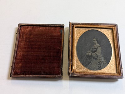 Lot 10 - Cased Images. An unusual quarter-plate ambrotype showing five ambrotype portraits...