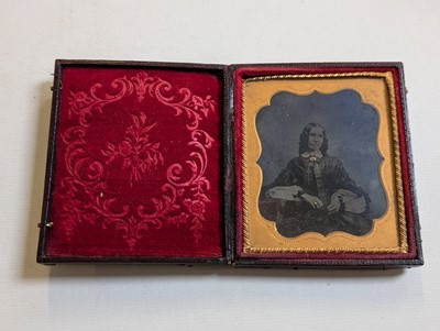 Lot 10 - Cased Images. An unusual quarter-plate ambrotype showing five ambrotype portraits...