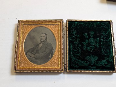 Lot 10 - Cased Images. An unusual quarter-plate ambrotype showing five ambrotype portraits...