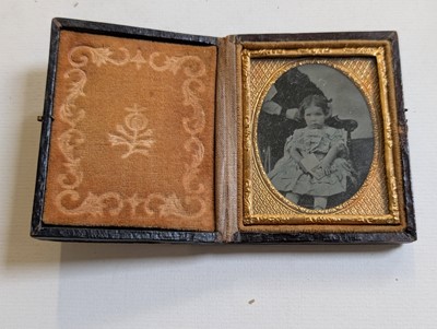 Lot 10 - Cased Images. An unusual quarter-plate ambrotype showing five ambrotype portraits...