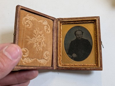 Lot 10 - Cased Images. An unusual quarter-plate ambrotype showing five ambrotype portraits...