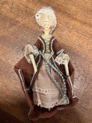 Lot 472 - Grödnertal Doll. A miniature wooden doll, circa 1820-1840, carved wooden body