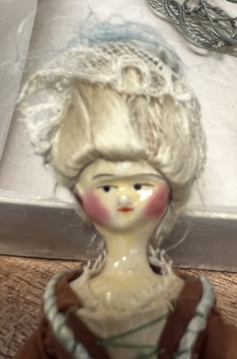 Lot 472 - Grödnertal Doll. A miniature wooden doll, circa 1820-1840, carved wooden body