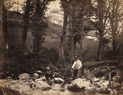 Lot 150 - Lloyd (John, died 1869). Man by a stream, and Llansantffraid Mill, 1855-60, two albumen prints