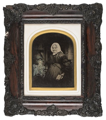 Lot 484 - Oversize half-plate ambrotypes of husband, wife and mother or mother-in-law