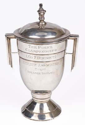 Lot 96 - Trophy Cup. A George VI silver twin handled covered trophy cup by Charles S Green & Co Ltd, Birmingham, 1937