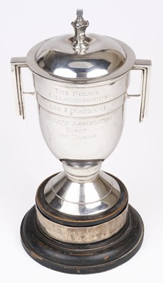 Lot 95 - Trophy Cup. A George VI silver Art Deco twin handled covered trophy cup by Charles S Green & Co Ltd, Birmingham, 1937