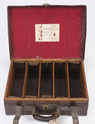Lot 273 - W.J. Jeffery & Co. A late Victorian leather and brass bound cartridge magazine