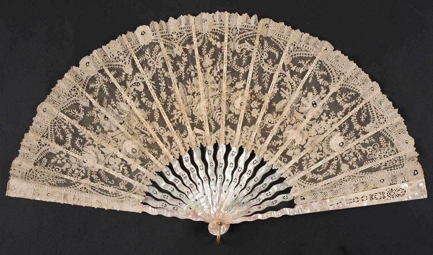 Lot 497 - Lace Fan. A Victorian Brussels lace fan, & other lace fans