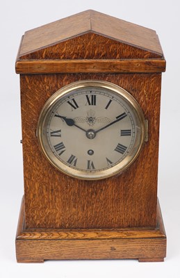 Lot 458 - Royal Air Force. A WWII RAF officer's mess oak mantel clock