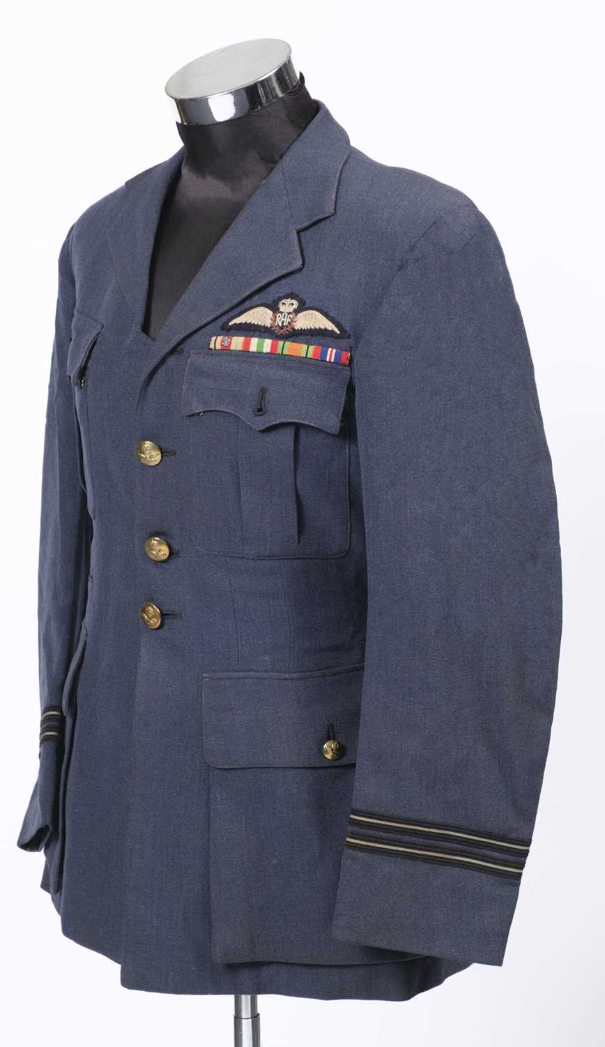 Lot 455 - RAF Uniforms. WWII uniforms including tunics, cap and battle blouse