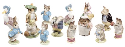 Lot 624 - Potter Beatrix. Beswick. A group of 14 Beatrix Potter figures, each with Beswick gold circle backstamp (BP-1a), issued 1948-1955
