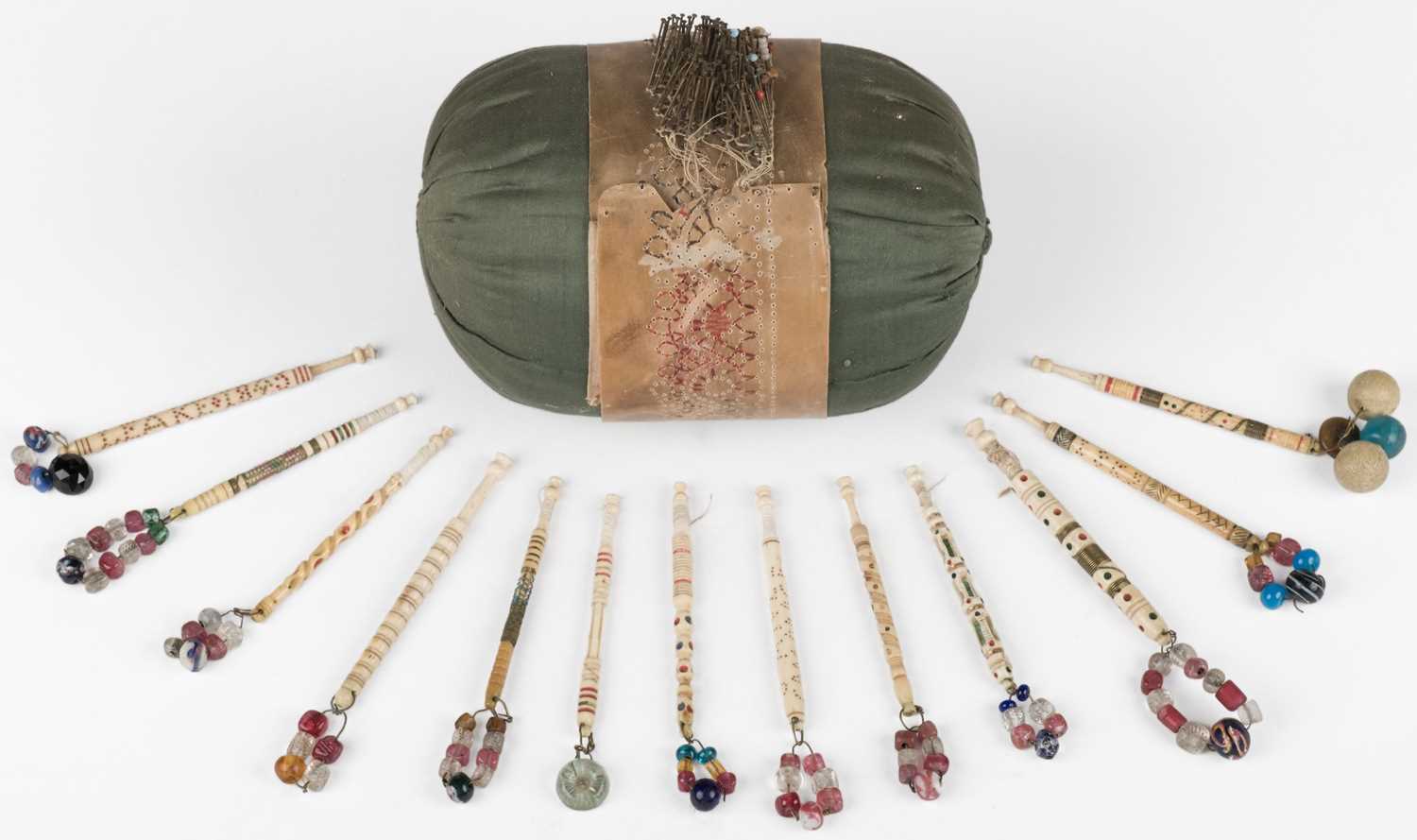 Lot 539 - Lace. A collection of bobbins and other lace-making accoutrements, 19th and 20th century