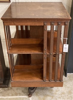 Lot 209 - Bookcase. A revolving bookcase, 20th century