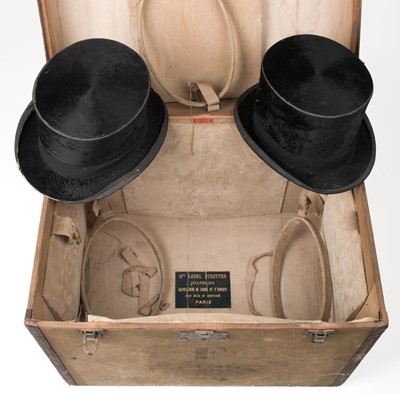 Lot 460 - Luggage. A hat trunk, Paris: Lebel Stritter, early 20th century, & 2 top hats, tailcoats & shirts