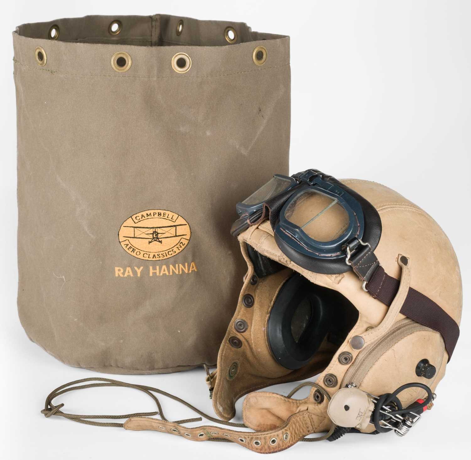 Lot 131 - Flying helmet. A brown leather flying helmet by Campbell Aero Classic NZ belonging to Ray Hanna
