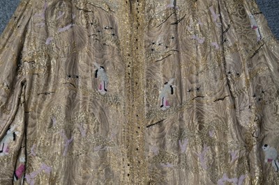 Lot 457 - Chinoiserie. A beaded gold lamé coat, 1920s