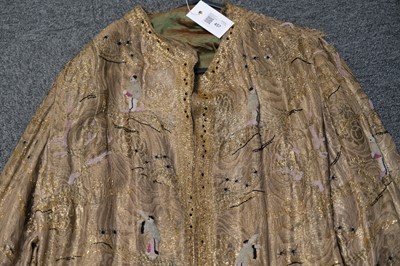 Lot 457 - Chinoiserie. A beaded gold lamé coat, 1920s