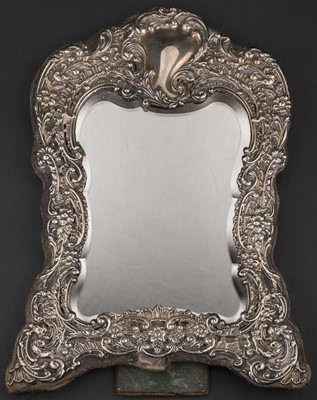 Lot 701 - Mirror. A Victorian silver mirror by Henry Matthews, Chester, 1900