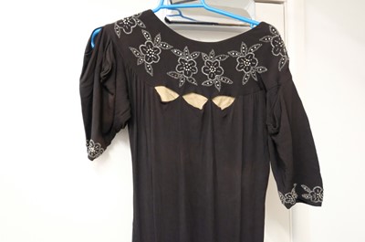 Lot 463 - Clothing. A group of 14 dresses, early 20th century and later