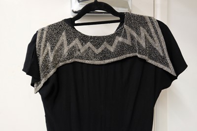 Lot 463 - Clothing. A group of 14 dresses, early 20th century and later
