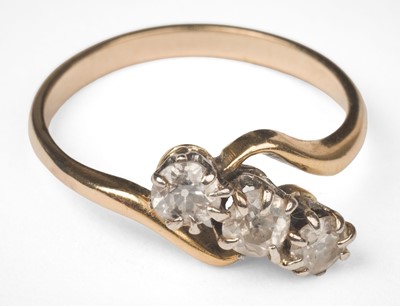 Lot 739 - Ring. A white and yellow metal diamond ring