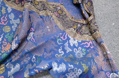 Lot 451 - Chinese Dragon Robe. A silk brocade nine-dragon robe, late Qing Dynasty