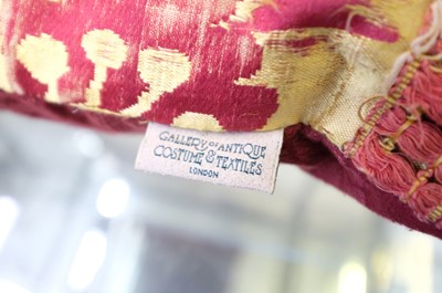 Lot 300 - Versace. A pair of Chinese Emperor cushions, 20th or 21st century, & 4 other cushions