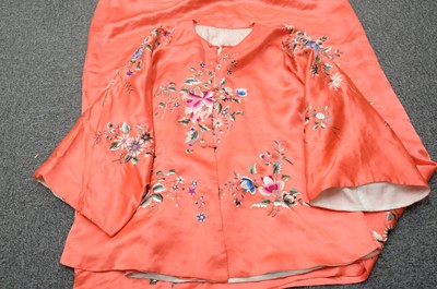 Lot 456 - Chinese. An embroidered coat, early 20th century, & an embroidered jacket and skirt