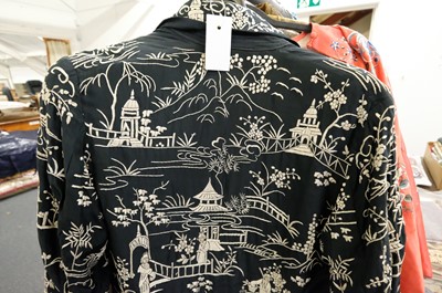 Lot 456 - Chinese. An embroidered coat, early 20th century, & an embroidered jacket and skirt