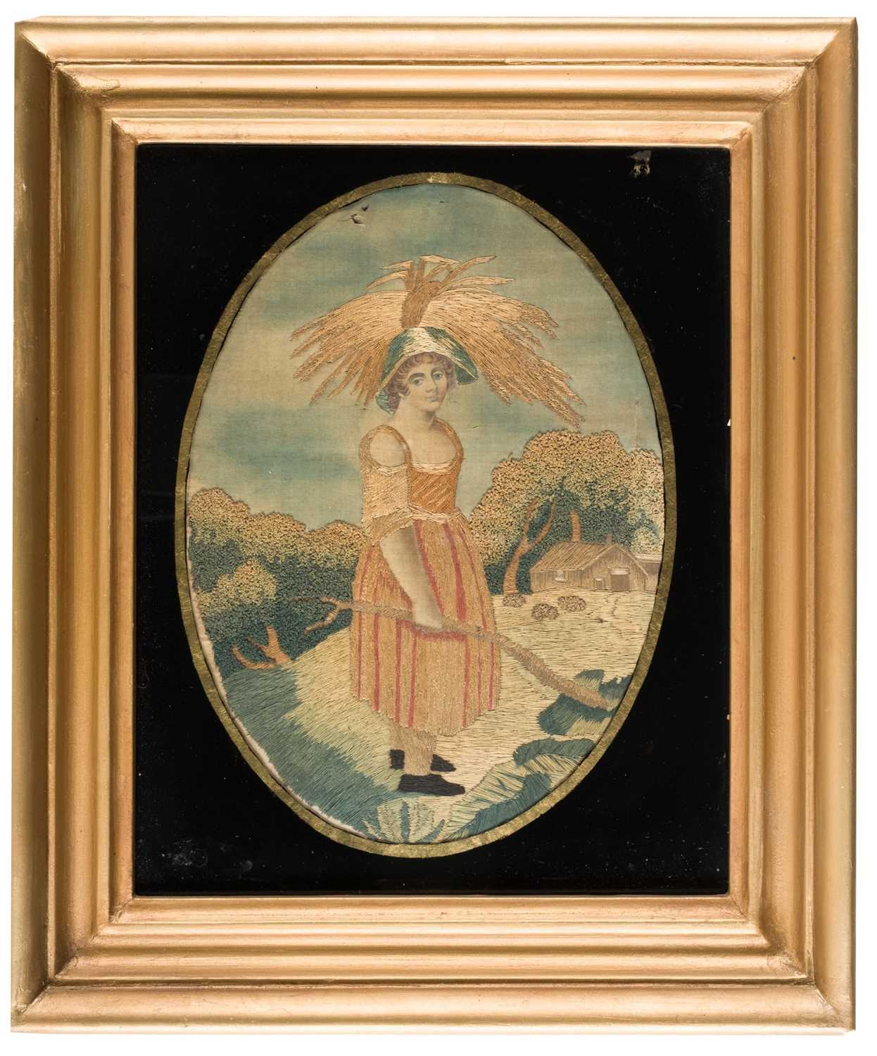 Lot 282 - Embroidered Pictures. A pair of oval needlework pictures of children, circa 1850