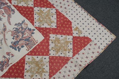 Lot 511 - Quilt. A broderie perse bedcover of 18th century chintz, early 19th century