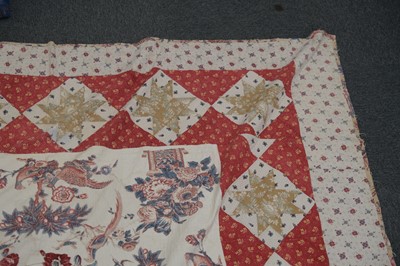 Lot 511 - Quilt. A broderie perse bedcover of 18th century chintz, early 19th century