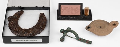 Lot 647 - Antiquities. A Roman bronze crossbow fibula and other items