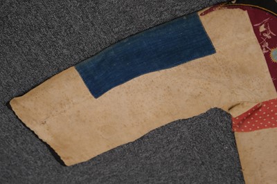 Lot 531 - Sudan. A Sudanese jibba and accompanying spear from the Madhist State era, circa 1880s-1890s