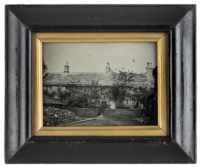 Lot 479 - Half-plate ambrotype of an unidentified stone cottage