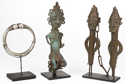 Lot 477 - Yoruba. A pair of Nigerian Yoruba Edan brass work staffs
