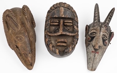 Lot 475 - Tribal masks. African wooden ceremonial masks